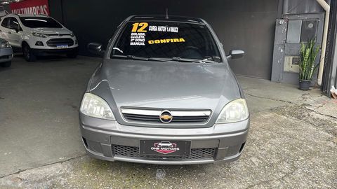 chevrolet corsa hatch maxx 14 flex carro sao bernardo do campo sp quer um carro economico e confortavel descubra o corsa 14 maxx 2012 manual visite nossa loja e veja de perto todas as vantagens que este modelo oferece 2 dono manual e chave copia laudo cautelar 100 aprovado chave presencial direcao hidraulica licenciado insulfilm travas eletricas porta copos vidros eletricos one motors certeza do melhor negocio fale agora com um de nossos consultores rodrigoadriana nos reservamos no direito de corrigir qualquer tipo de erro de digitacao carro sao bernardo do campo sp chevrolet corsa 2012 flex manual hatch 167906 cinza 4 portas alarme banco com regulagem de altura encosto de cabeca traseiro volante com regulagem de altura ar quente desembacador traseiro travas eletricas vidros eletricos direcao hidraulica