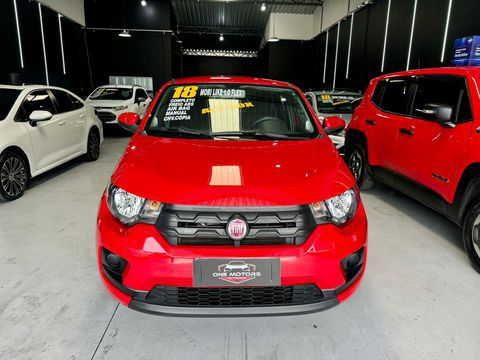 fiat mobi like 10 flex 2018 carro sao bernardo do campo sp o fiat mobi like 10 flex 5p 2018 e um carro subcompacto com motor 10 fire evo bicombustivel que oferece 75 cv com etanol e 73 cv com gasolina ele vem com uma transmissao manual de 5 marchas e direcao hidraulica1 algumas caracteristicas incluem capacidade de porta malas 235 litros consumo urbano a 89 kml consumo rodoviario a 15 kml seguranca airbags frontais freios abs cintos de 3 pontos para todos os ocupantes e isofix1 conforto ar condicionado ar quente volante ajustavel em altura banco traseiro rebativel e um carro eficiente para uso urbano e rodoviario com boa construcao e potencia adequada para trajetos curtos one motors certeza do melhor negocio nos reservamos no direito de corrigir qualquer tipo de erro de digitacao fiat mobi 2018 flex hatch carro sao bernardo do campo sp fiat mobi 2018 flex manual hatch 47735 vermelho 4 portas alarme ar condicionado banco com regulagem de altura computador de bordo volante com regulagem de altura airbag ar quente vidros eletricos radio